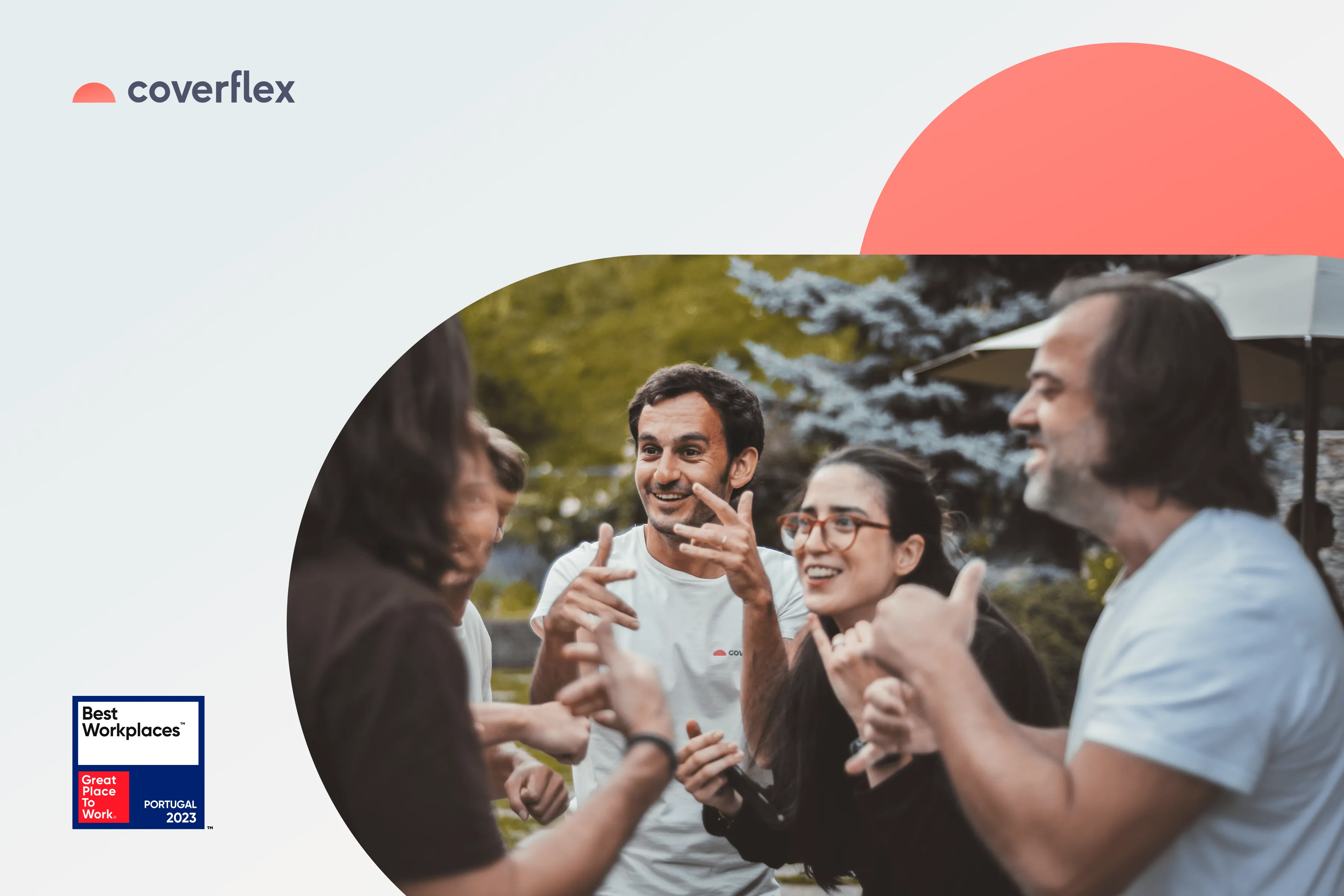 coverflex employees smiling and gesturing outdoors in a circle celebrating their Best Workplaces Portugal 2023 award